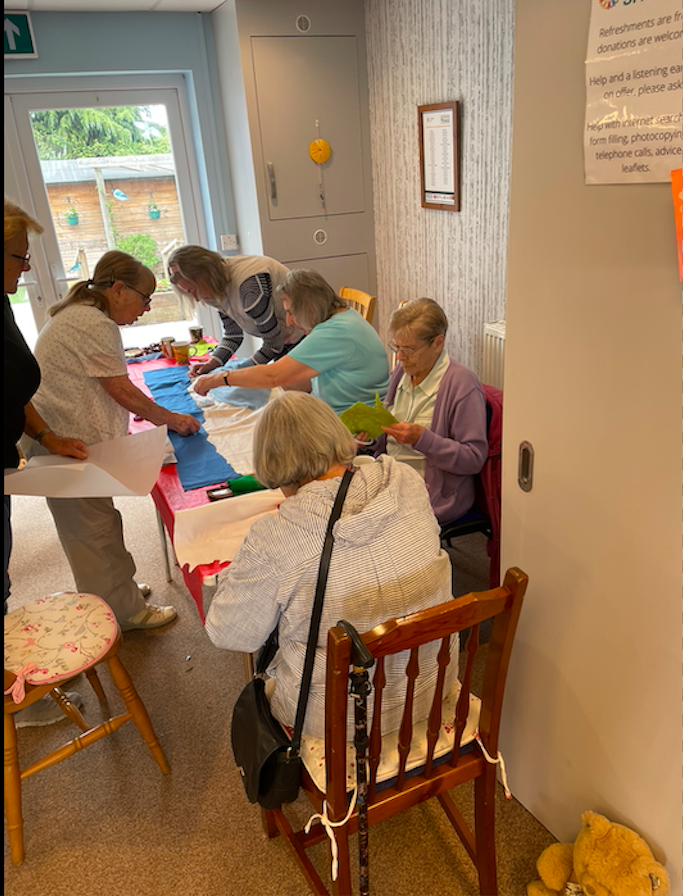 Happy crafters working on our new wallhanging